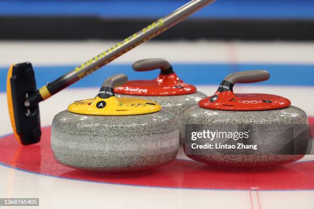 Curling stones are seen during the Curling Mixed Doubles Round Robin on Day 1 of the Beijing 2022 Winter Olympics at National Aquatics Centre on...