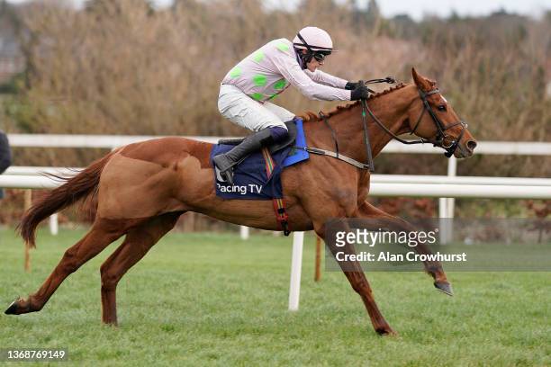 Paul Townend riding Vauban clear the last to win The Racing TV '12 Per Month This Weekend Only' Spring Juvenile Hurdle from Davy Russell and Fil Dor...