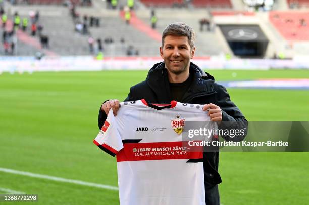 Thomas Hitzlsperger, sport director of VfB Stuttgart presents a special jersey for this match day ahead of the Bundesliga match between VfB Stuttgart...