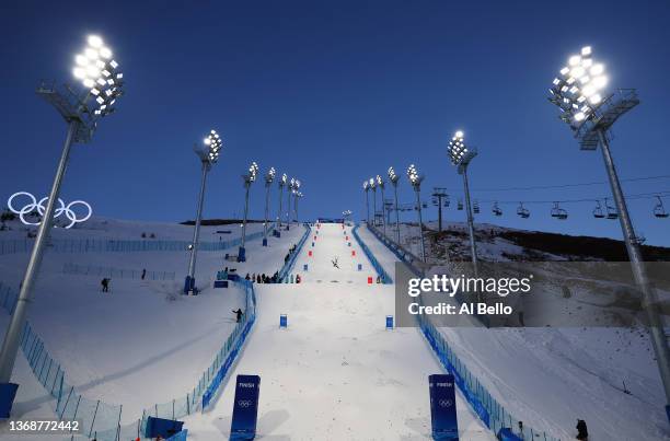 General view of the course as a athlete completes a practice run ahead of the Men's Freestyle Skiing Moguls Final on Day 1 of the Beijing 2022 Winter...