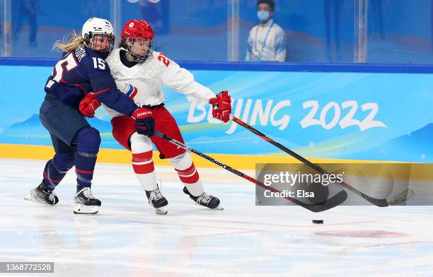 Defender Savannah Harmon of Team United States skates against forward Polina Bolgareva of Team ROC in the second period during the Women's...