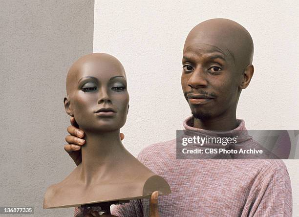 Cast member Jimmie Walker wearing a make-up skin cap to appear bald. Image dated 1976.