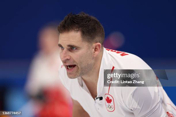 John Morris of Team Canada competes against Team United States during the Curling Mixed Doubles Round Robin on Day 1 of the Beijing 2022 Winter...