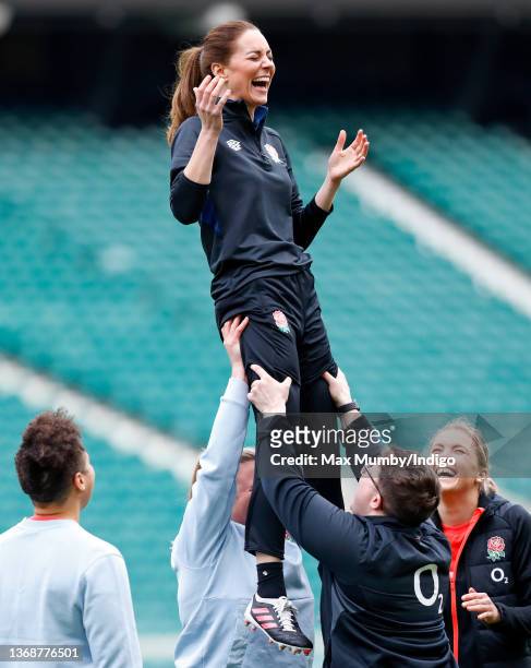 Catherine, Duchess of Cambridge takes part in a lineout drill during an England rugby training session, after becoming Patron of the Rugby Football...