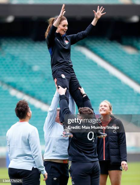 Catherine, Duchess of Cambridge takes part in a lineout drill during an England rugby training session, after becoming Patron of the Rugby Football...