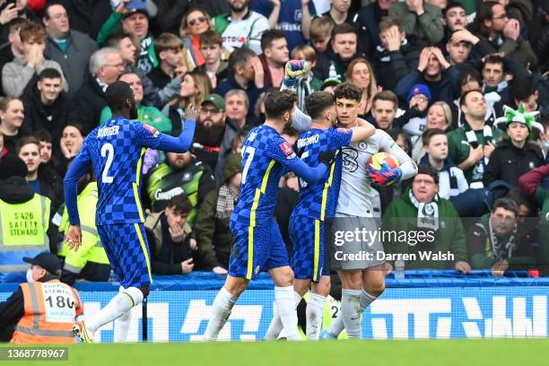 Kepa Arrizabalaga of Chelsea celebrates with teammates after saving a penalty shot from Ryan Hardie of Plymouth Argyle during the Emirates FA Cup...