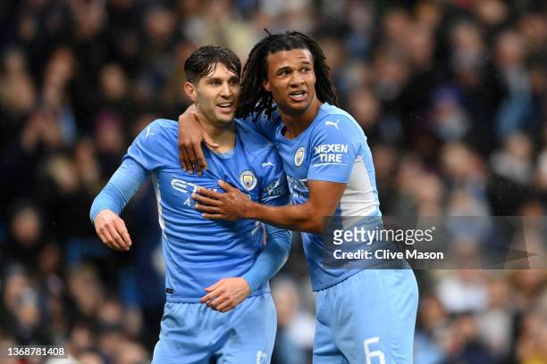 John Stones celebrates with Nathan Ake of Manchester City after scoring their team's second goal during the Emirates FA Cup Fourth Round match...