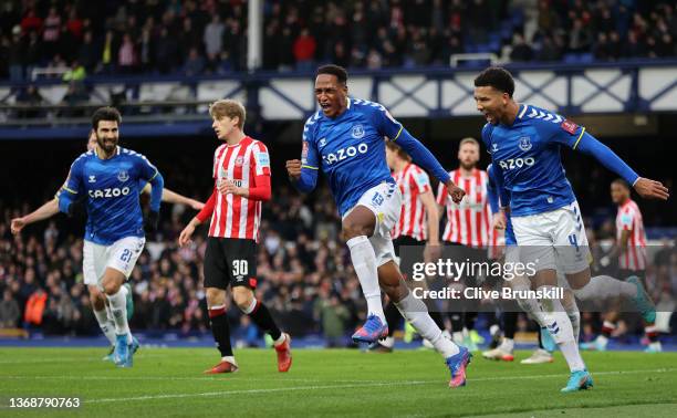 Yerry Mina of Everton celebrates with team mate Mason Holgate after scoring their sides first goal during the Emirates FA Cup Fourth Round match...