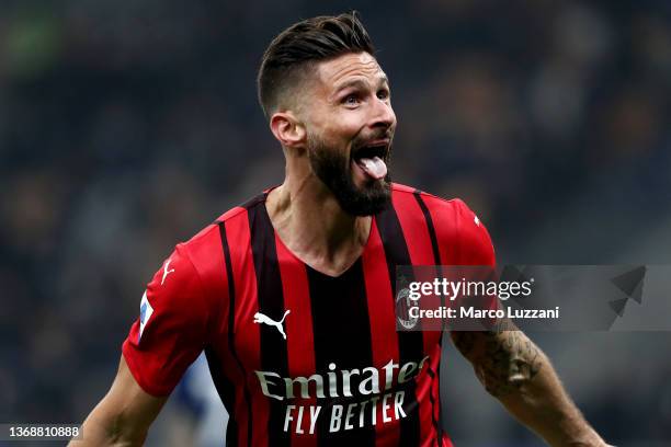 Olivier Giroud of AC Milan celebrates after scoring their team's second goal during the Serie A match between FC Internazionale and AC Milan at...