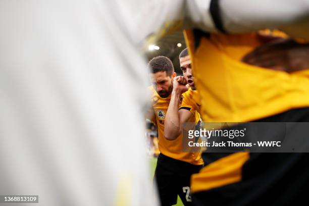 Conor Coady of Wolverhampton Wanderers speaks to his teammates in the huddle ahead of his 300th appearance for the club prior to the Emirates FA Cup...
