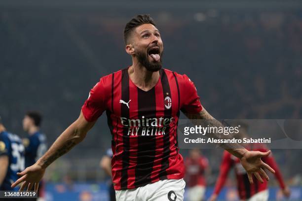 Olivier Giroud of AC Milan celebrates after scoring the second goal of his team during the Serie A match between FC Internazionale and AC Milan at...