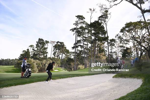 Charl Schwartzel of South Africa plays a shot from a bunker on the 14th hole during the third round of the AT&T Pebble Beach Pro-Am at Spyglass Hill...