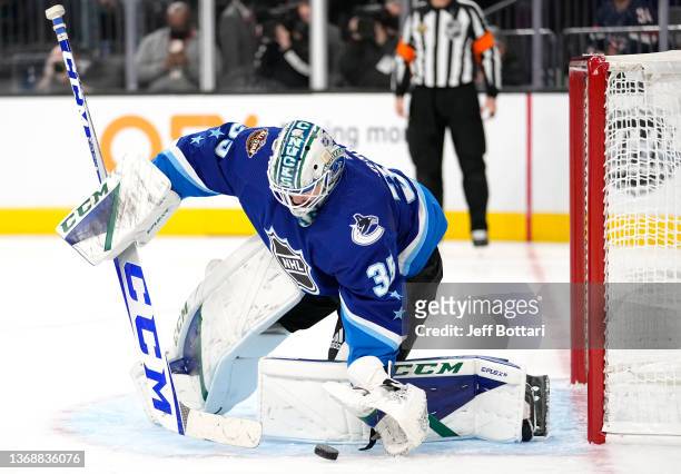 Thatcher Demko of the Vancouver Canucks of the Pacific Division stops the puck during the 2022 NHL All-Star game between the Pacific Division and the...