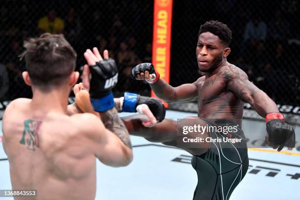 Hakeem Dawodu of Canada kicks Michael Trizano in their featherweight fight during the UFC Fight Night event at UFC APEX on February 05, 2022 in Las...