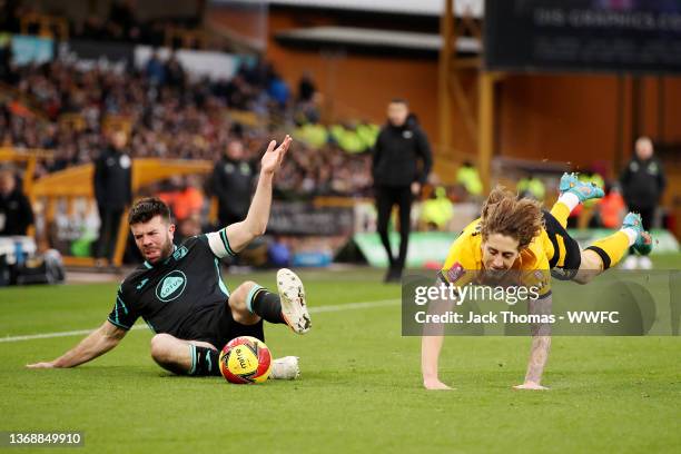 Fabio Silva of Wolverhampton Wanderers battles for possession against Grant Hanley of Norwich City during the Emirates FA Cup Fourth Round match...