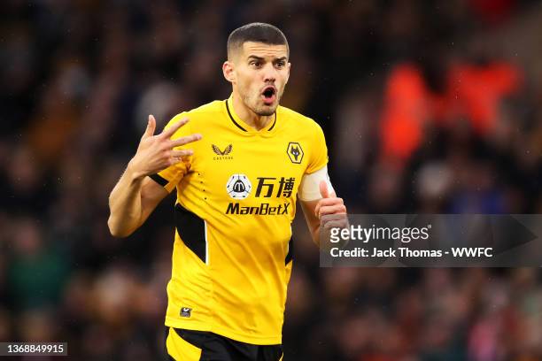 Conor Coady of Wolverhampton Wanderers gives his team instructions during the Emirates FA Cup Fourth Round match between Wolverhampton Wanderers and...