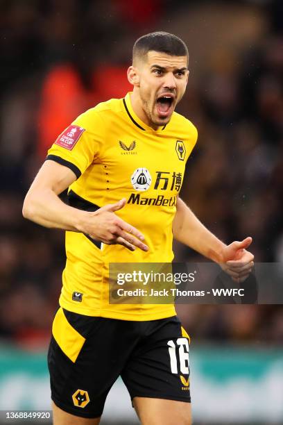 Conor Coady of Wolverhampton Wanderers gives his team instructions during the Emirates FA Cup Fourth Round match between Wolverhampton Wanderers and...