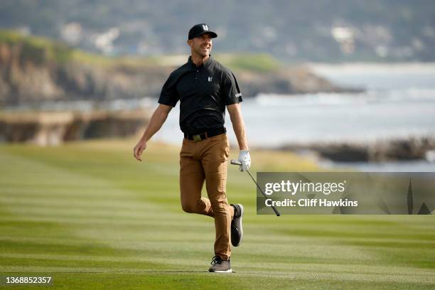 Former 49ers quarterback Alex Smith plays a shot on the 18th hole during the third round of the AT&T Pebble Beach Pro-Am at Pebble Beach Golf Links...