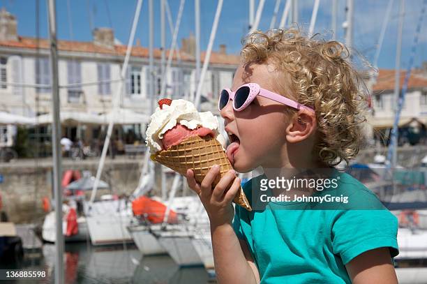 child with ice cream - charente maritime stock pictures, royalty-free photos & images