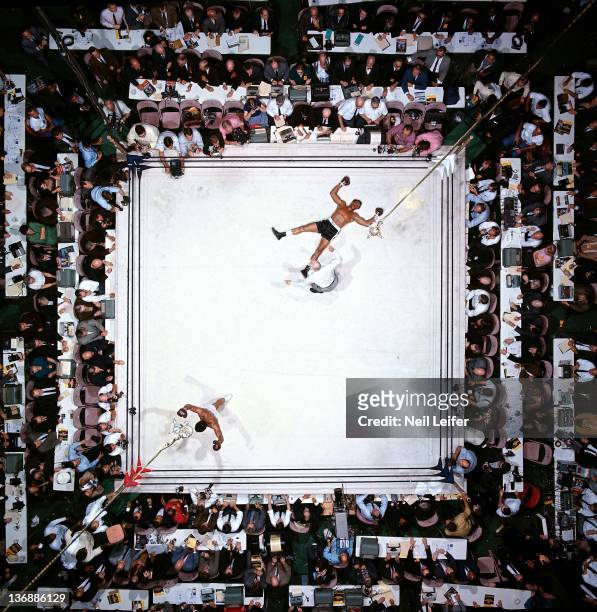 Boxing: World Heavyweight Title: Aerial view of Muhammad Ali victorious after round 3 knockout of Cleveland Williams during fight at Astrodome....