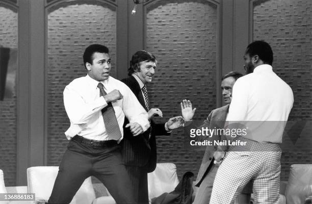 Boxing: NABF Heavyweight Title Preview: Muhammad Ali and Joe Frazier with Dick Cavett during taping on television set of THE DICK CAVETT SHOW at ABC...