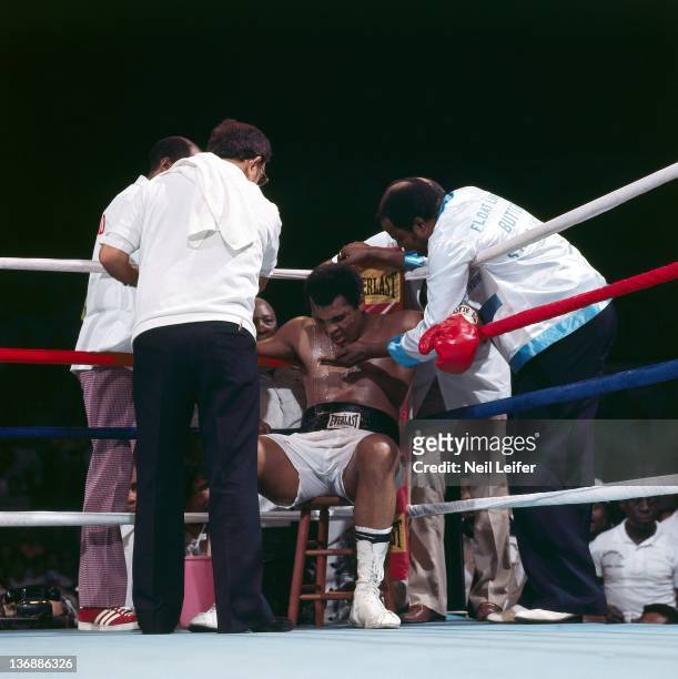 Boxing: WBC/ WBA World Heavyweight Title: Muhammad Ali in corner after round 10 during fight vs Joe Frazier at Araneta Coliseum. View of cornermen...