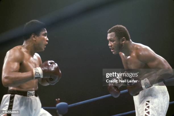 Boxing: NABF Heavyweight Title: Joe Frazier in action vs Muhammad Ali during fight at Madison Square Garden. New York, NY 1/28/1974 CREDIT: Neil...