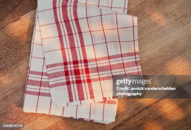 tea towel - folded towels stock pictures, royalty-free photos & images