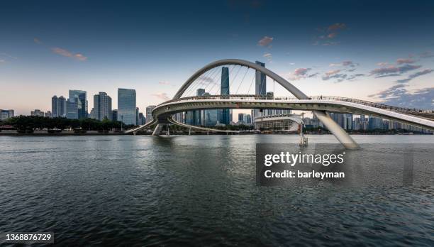 urban skyline against sunset - guangzhou stock pictures, royalty-free photos & images