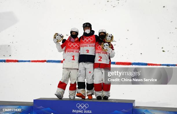 Gold medalist Walter Wallberg of Team Sweden, silver medalist Michael Kingsbury of Team Canada and bronze medalist Ikuma Horishima of Team Japan...