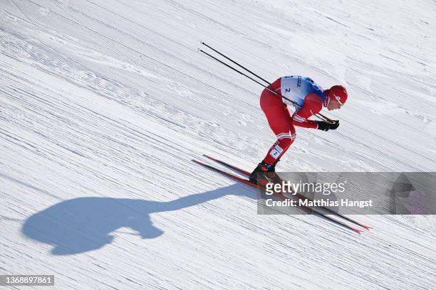 Alexander Bolshunov of Team ROC competes during the Men's Cross-Country Skiing 15km + 15km Skiathlon on Day 2 of the Beijing 2022 Winter Olympic...