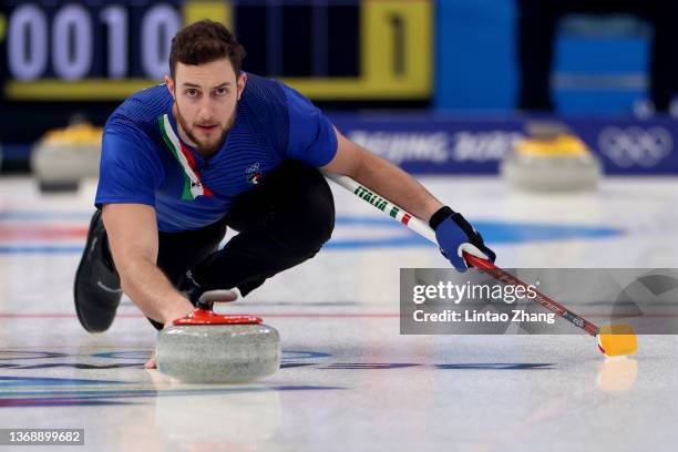 Amos Mosaner of Team Italy competes against Team China during the Curling Mixed Doubles Round Robin on Day 2 of the Beijing 2022 Winter Olympics at...