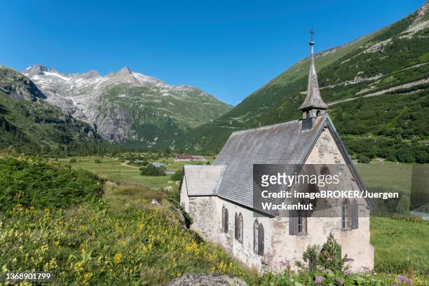 landscape of the rhone valley in front of the rhone glacier and the anglican chapel in the hamlet of gletsch, oberwald, valais, switzerland - rhone valley stock pictures, royalty-free photos & images