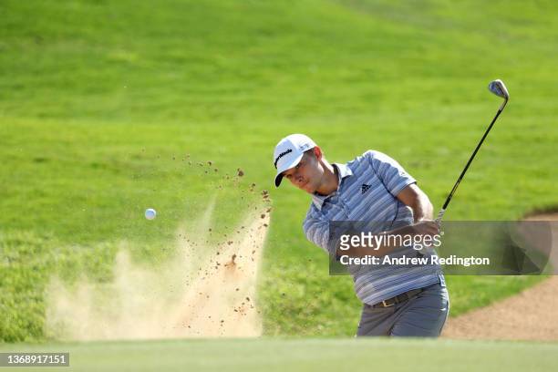 Nicolai Hojgaard of Norway plays his third shot on the eighth hole from the bunker during day four of the Ras al Khaimah Championship presented by...