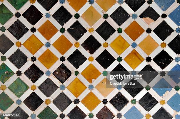 tiled wall in nasrid palace,alhambra,granada,andalucia,spain - spaanse cultuur stockfoto's en -beelden