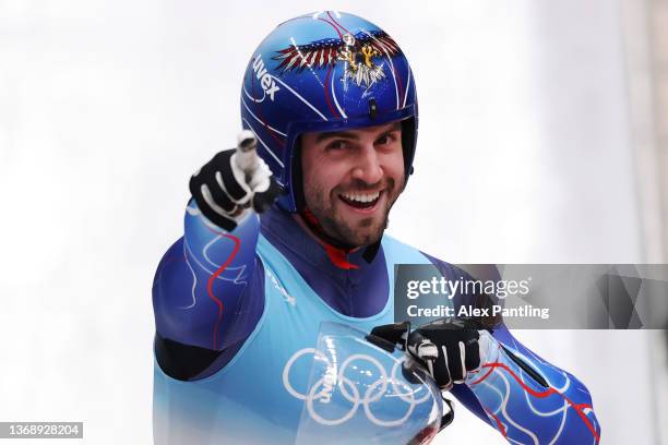 Chris Mazdzer of Team United States reacts after they slide during the Men's Singles Luge Run 3 on day two of the Beijing 2022 Winter Olympic Games...
