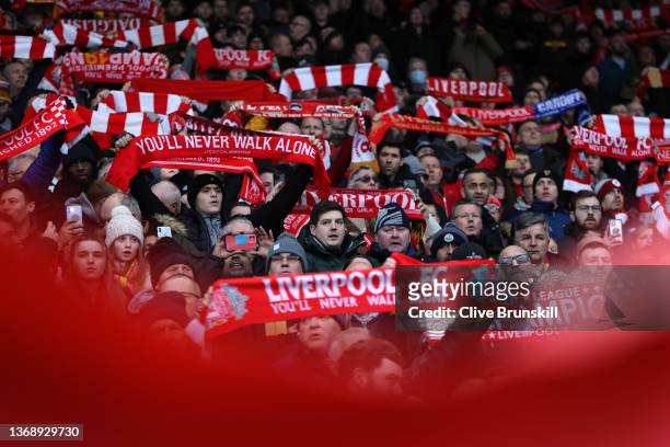 Liverpool fans with raised scarves during the singing of 'You'll never walk alone' during the Emirates FA Cup Fourth Round match between Liverpool...