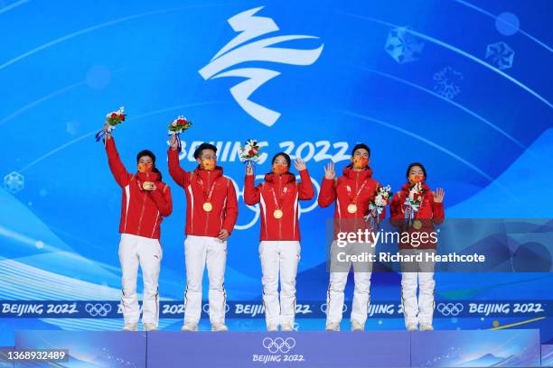 Gold medallists Kexin Fan, Ziwei Ren, Chunyu Qu, Dajing Wu and Yuting Zhang of Team China celebrate during the Mixed Team Relay Speed Skating medal...