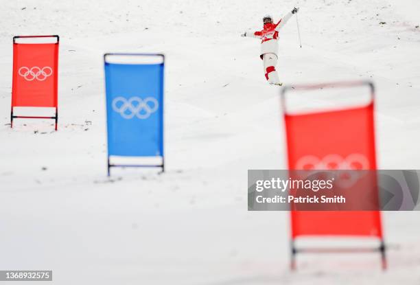 Justine Dufour-Lapointe of Team Canada reacts after crashing on their run during the Women's Freestyle Skiing Moguls Final on Day 2 of the Beijing...