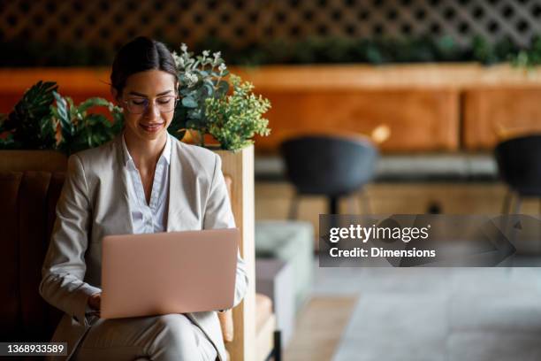successful businesswoman working laptop at cafe - dress code stock pictures, royalty-free photos & images