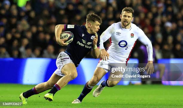 Darcy Graham of Scotland goes past Elliot Daly during the Guinness Six Nations match between Scotland and England at BT Murrayfield Stadium on...