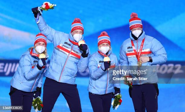 Gold Medalists Marte Olsbu Roeiseland, Tarjei Boe,Tiril Eckhoff and Johannes Thingnes Boe of Team Norway celebrate during the BiathloMixed Relay...