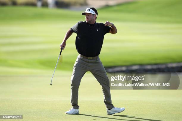 Bubba Watson of USA reacts after sinking a putt on the 18th hole during day four of the PIF Saudi International at Royal Greens Golf & Country Club...