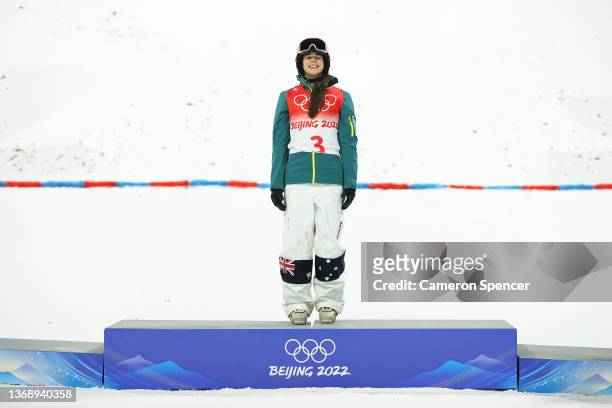 Gold medallist Jakara Anthony of Team Australia celebrates during the Women's Freestyle Skiing Moguls flower ceremony at Genting Snow Park on...