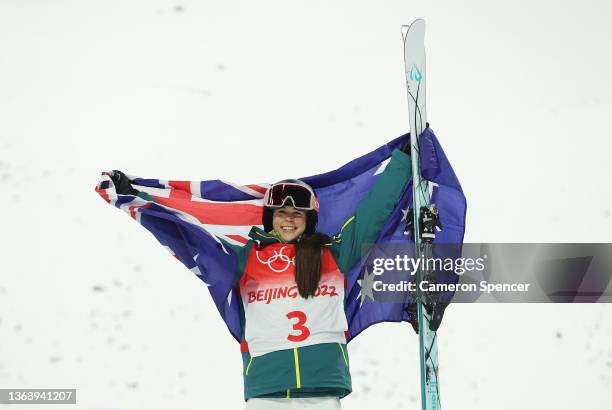 Gold medallist Jakara Anthony of Team Australia celebrates during the Women's Freestyle Skiing Moguls flower ceremony at Genting Snow Park on...