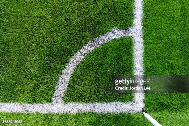 artificial football field of the corner kick - football pitch top view stock pictures, royalty-free photos & images