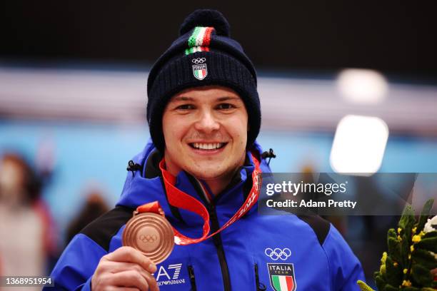 Bronze medallist Dominik Fischnaller of Team Italy poses during the Men's Singles Luge medal ceremony on day two of the Beijing 2022 Winter Olympic...