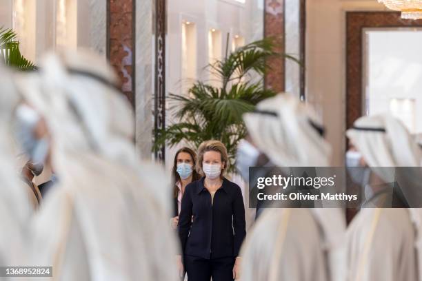 Queen Mathilde of Belgium, followed by Foreign Minister Sophie Wilmès arrive at the International airport prior to board the governmental plane to...