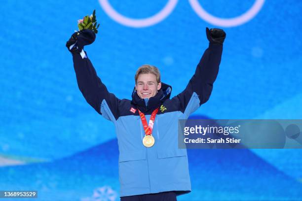 Gold medalist Walter Wallberg of Team Sweden celebrates during the Men's Moguls medal ceremony at Medal Plaza on February 06, 2022 in Zhangjiakou,...