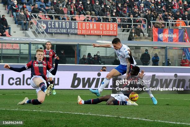 Andrea Pinamonti of Empoli FC competes the ball with Adama Soumaoro Jerdy Schouten of Bologna FC during the Serie A match between Bologna FC and...